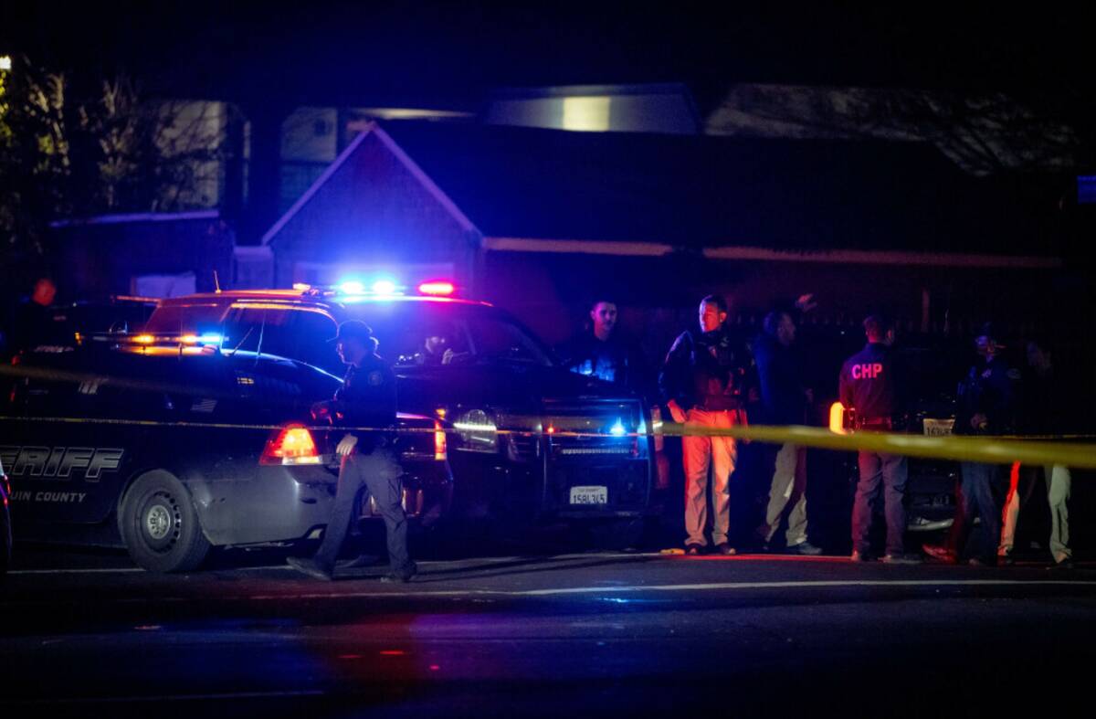 First responders at scene of a mass shooting Saturday, Nov. 29, 2025, in Stockton, Calif. (AP P ...