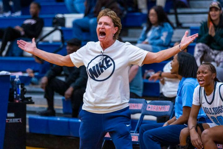 Centennial head coach Karen Weitz reacts to the lack of a foul call on her player against Bisho ...