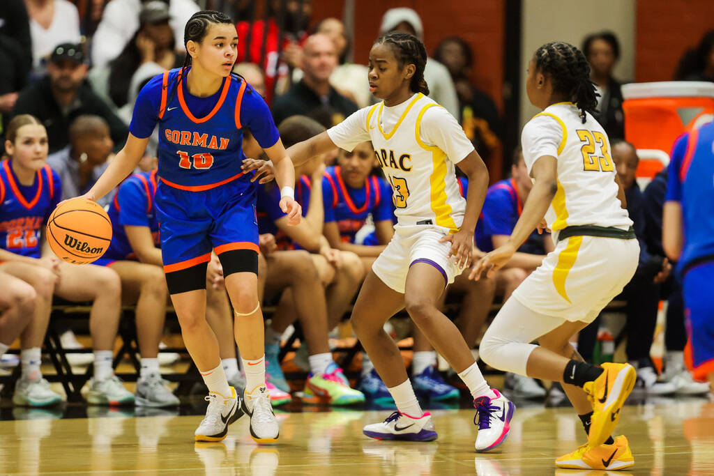 Bishop Gorman point guard Aaliah Spaight (10) dribbles the ball during a Class 5A girls basketb ...