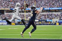Las Vegas Raiders cornerback Kyu Blu Kelly (36) intercepts a pass intended for Los Angeles Char ...