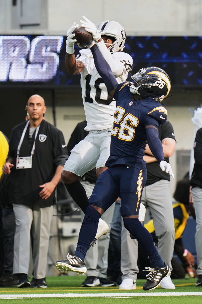 Los Angeles Chargers cornerback Donte Jackson (26) defends a pass intended for Las Vegas Raider ...