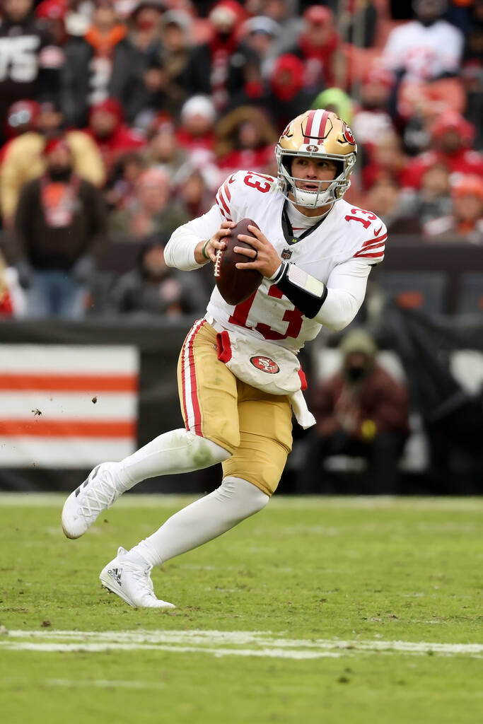 San Francisco 49ers quarterback Brock Purdy (13) looks to throw the ball during an NFL football ...