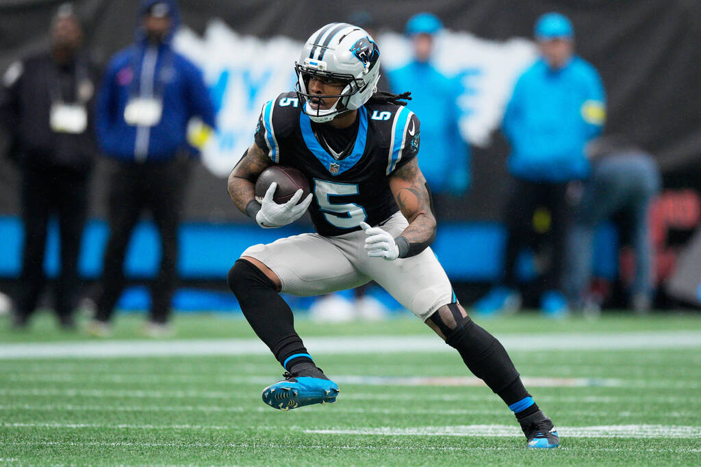 Carolina Panthers running back Rico Dowdle runs against the Los Angeles Rams during the first h ...