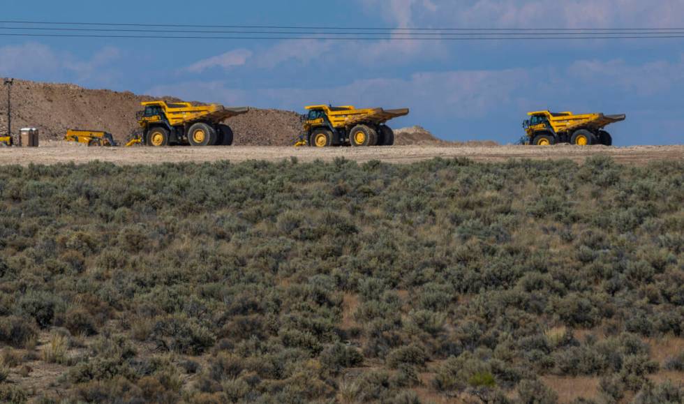 Construction vehicles work the land at the Thacker Pass mine project on July 8, 2025, near Orov ...