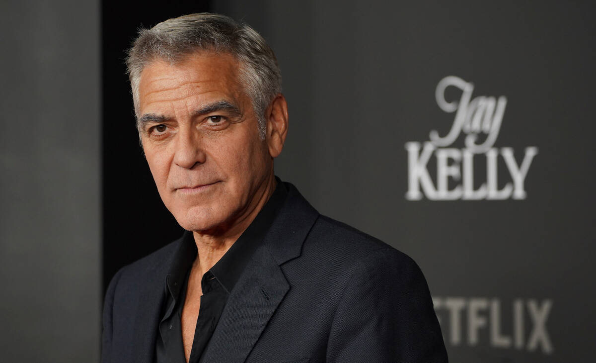 George Clooney arrives at the premiere of "Jay Kelly" on Tuesday, Nov. 11, 2025, at T ...