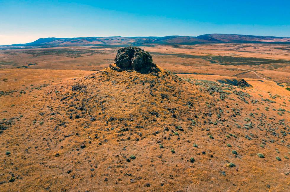 Sentinel Rock, a sacred site for the Fort McDermitt Paiute and Shoshone Tribe, sits above the n ...