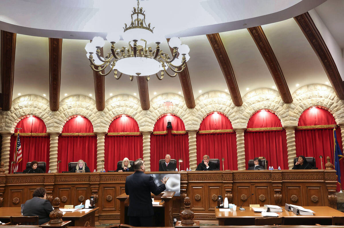 Justices Elissa F. Cadish, Chief Justice Douglas Herndon, Justice Patricia Lee, Justice Ron D. ...