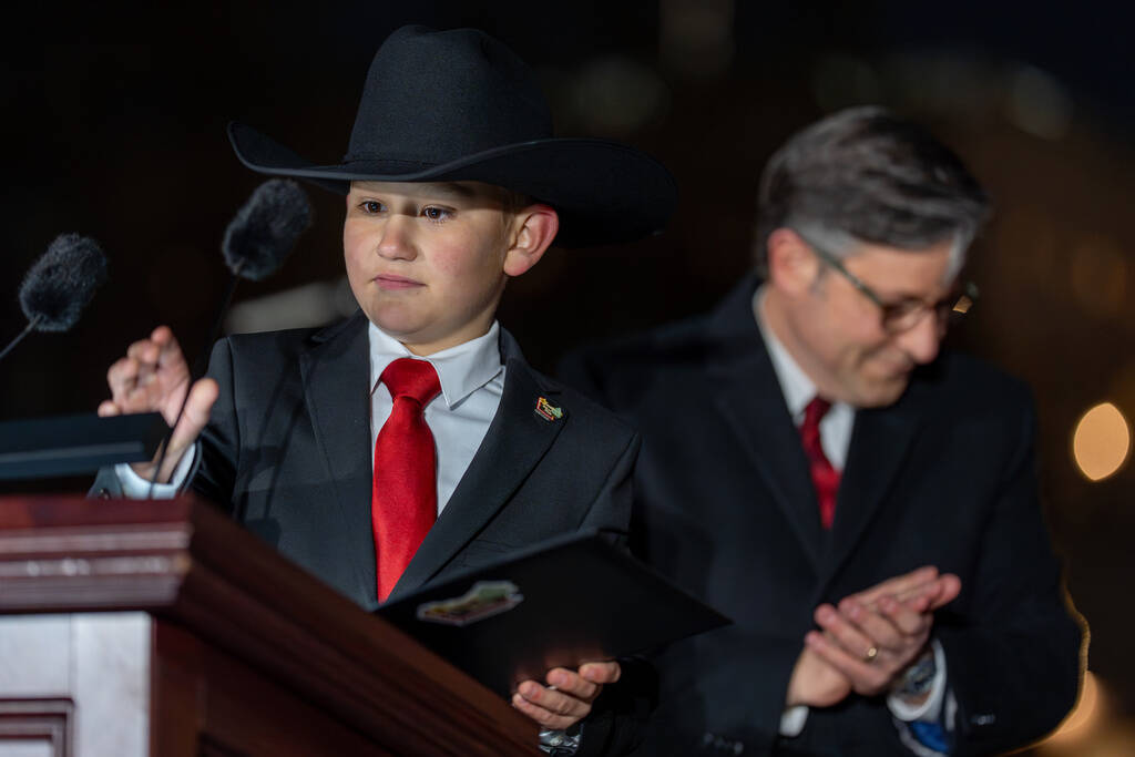 Grady Armstrong, a fourth-grade student from Virginia City, Nev., left, joined by House Speaker ...