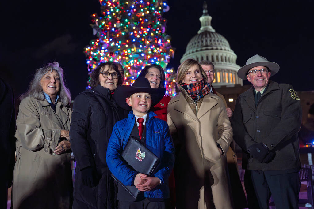 Grady Armstrong, a fourth-grade student from Virginia City, Nev., stands with members of the Ne ...