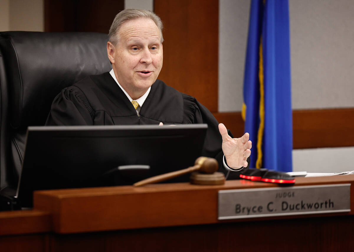 Family Court Judge Bryce Duckworth presides over a case at the Regional Justice Center on Dec. ...