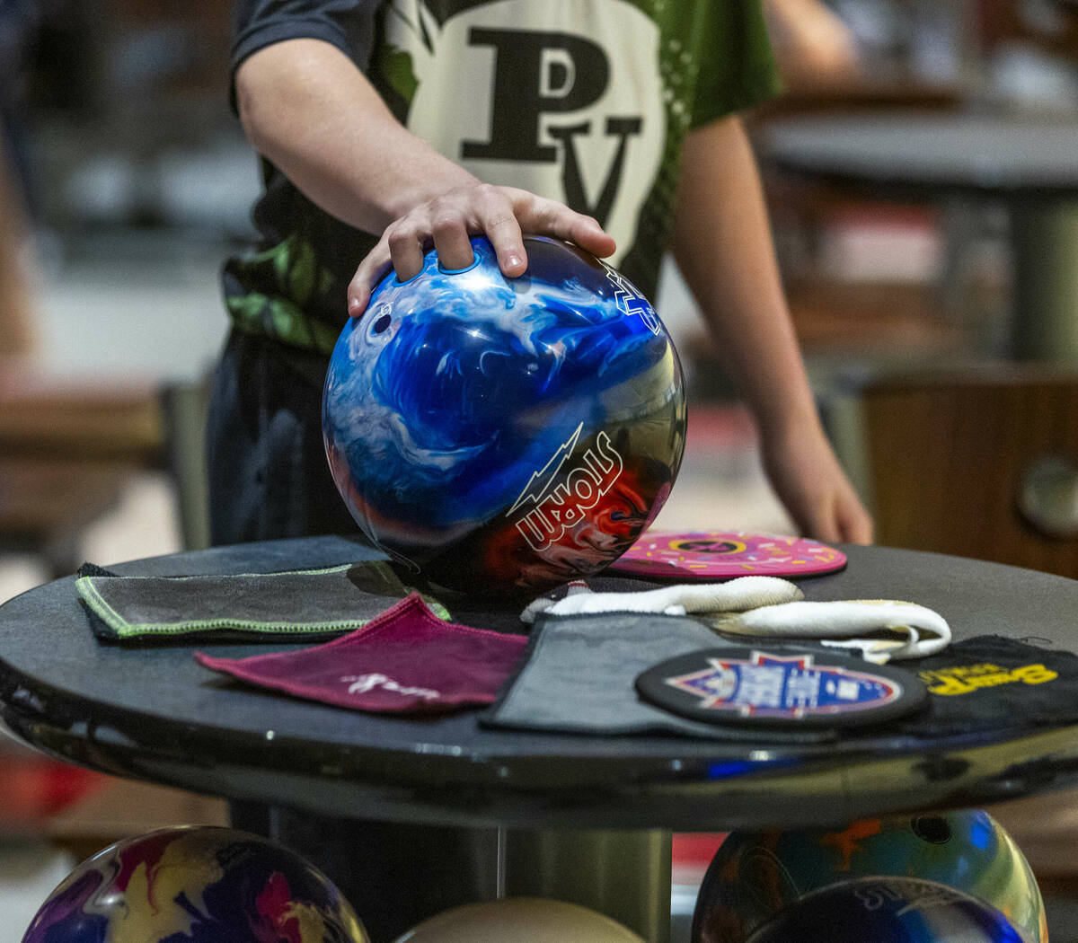 A Palo Verde bowler sets his ball down against Liberty during their 5A high school boys bowling ...