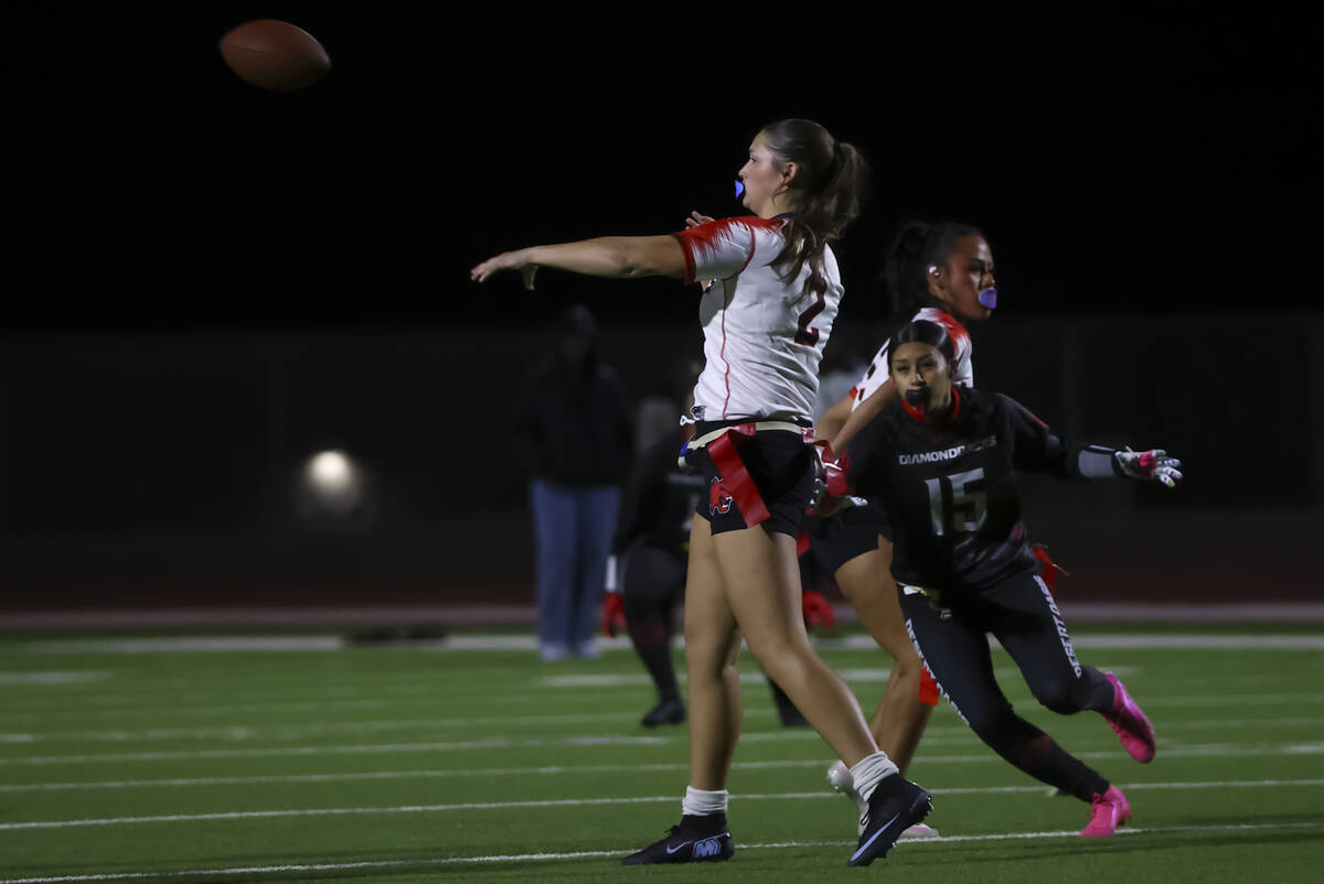 Las Vegas’ Alexandria Lindaman (2) throws a pass under pressure from Desert Oasis' ...