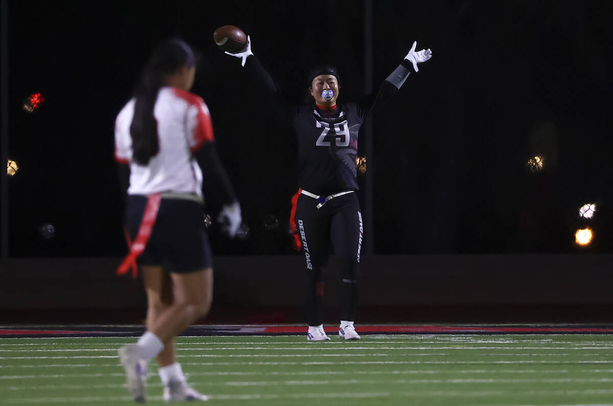Desert Oasis' Akiko Higa (29) celebrates a touchdown against Las Vegas during a flag footb ...