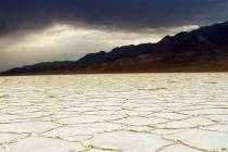 Storm clouds build over Badwater Basin in this undated photo from Death Valley National Park in ...