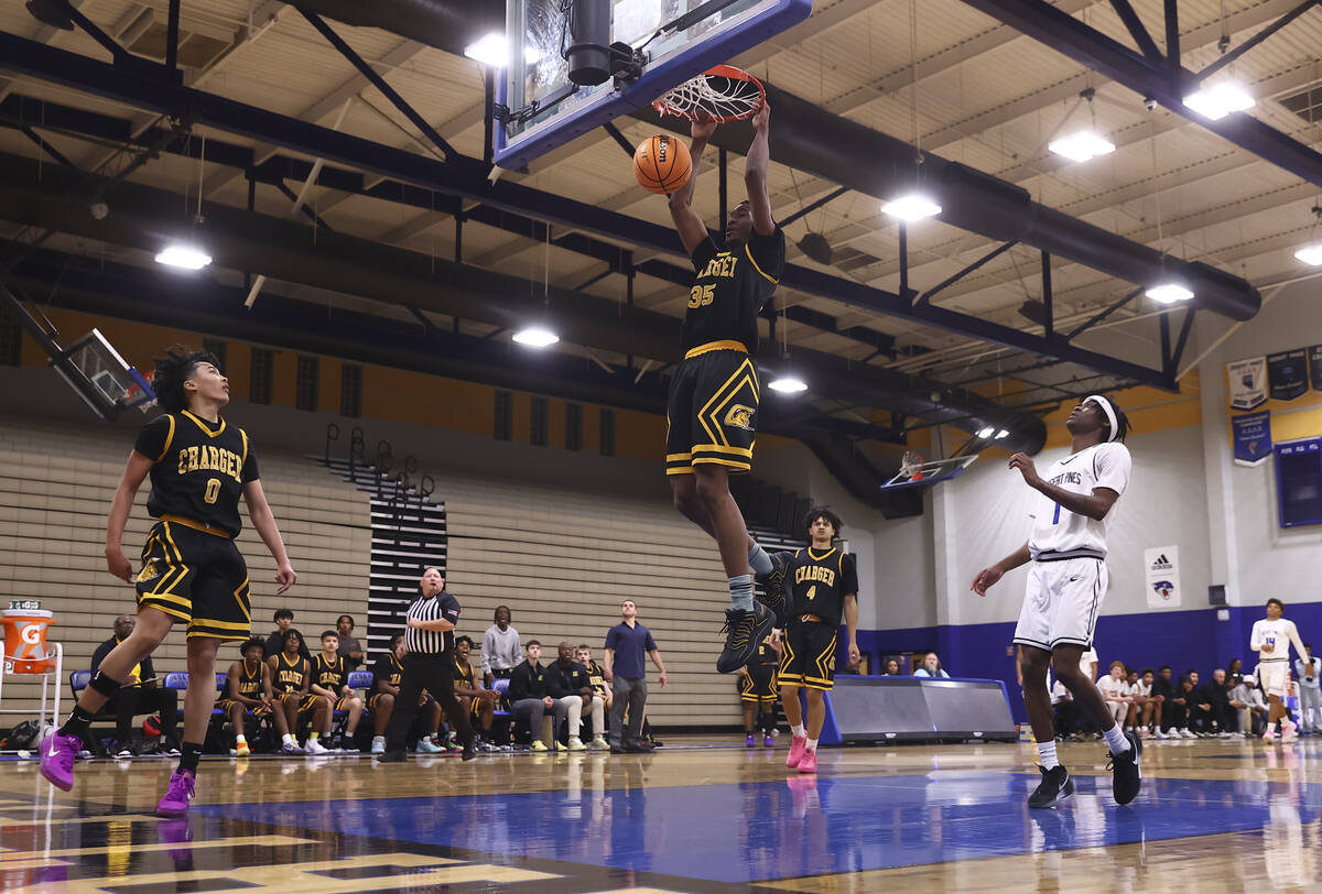 Clark small forward/power forward Devan Christion (35) dunks the ball during the second half of ...