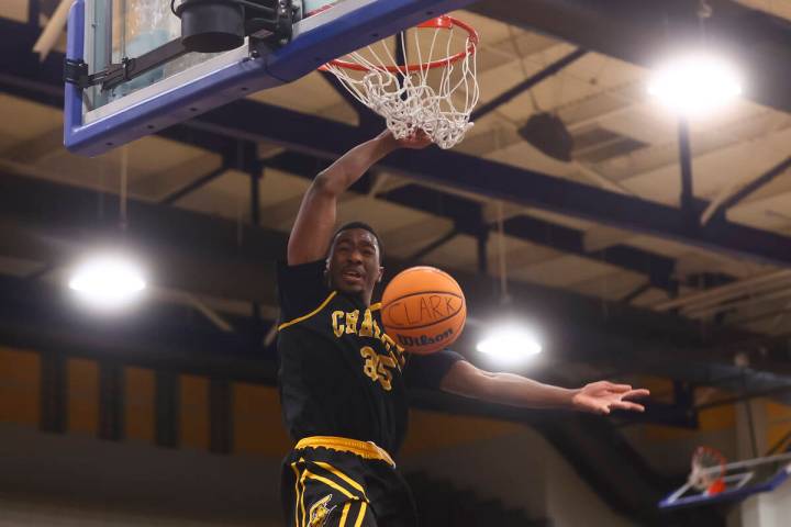 Clark small forward/power forward Devan Christion (35) dunks the ball during the second half of ...