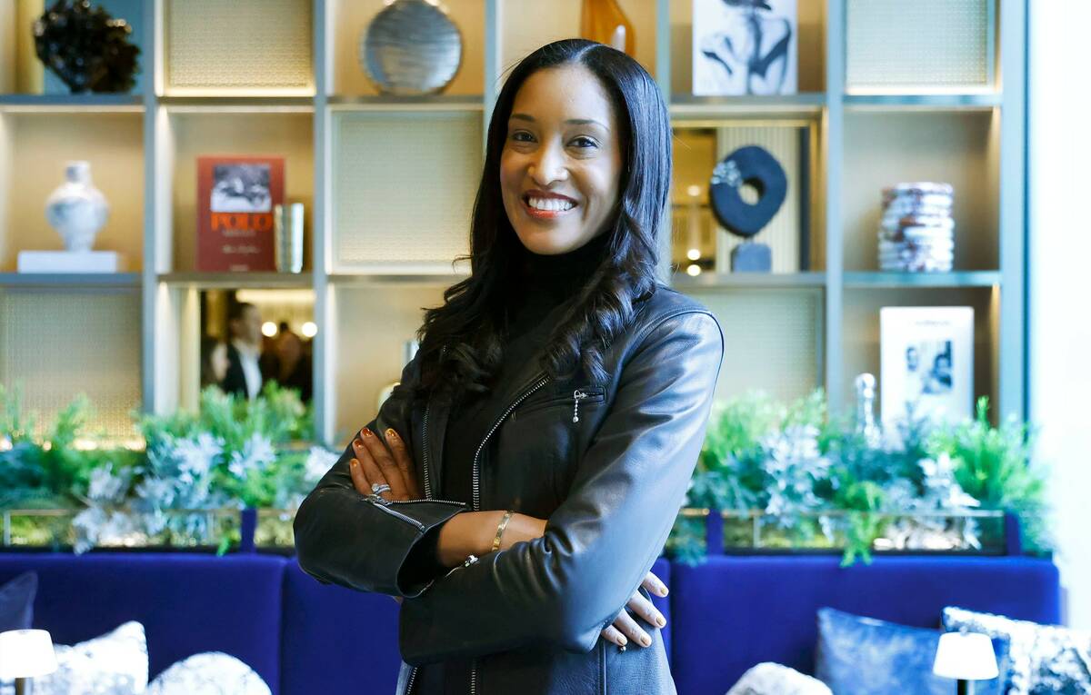 Dana Pouwels, head of airport lounge for Chase, poses for a photo at the newly opened Chase Sap ...