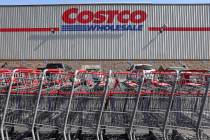 Shopping carts are lined up in front of a Costco store on Feb. 25, 2021, in Inglewood, Californ ...