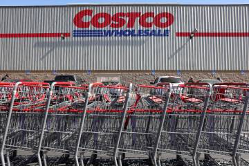 Shopping carts are lined up in front of a Costco store on Feb. 25, 2021, in Inglewood, Californ ...