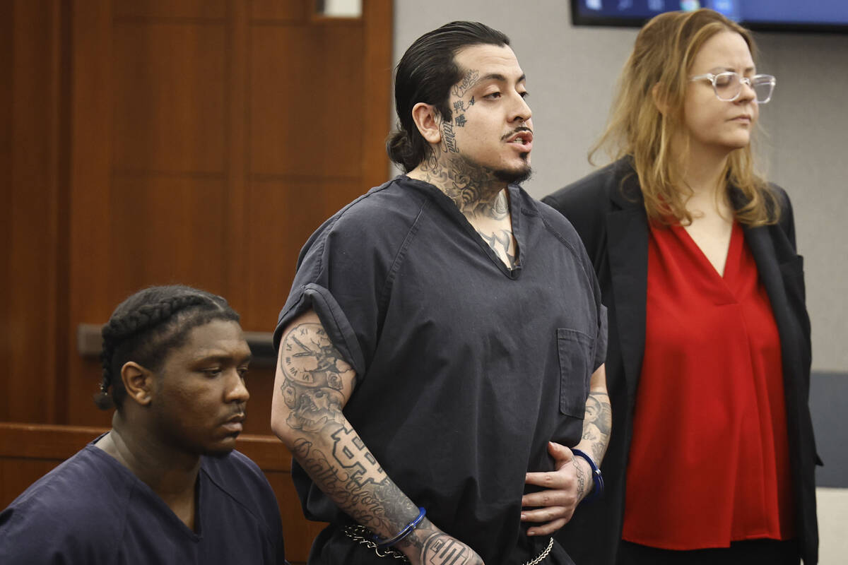 Henry Ramirez, middle, appears during his sentencing hearing at the Regional Justice Center Tue ...
