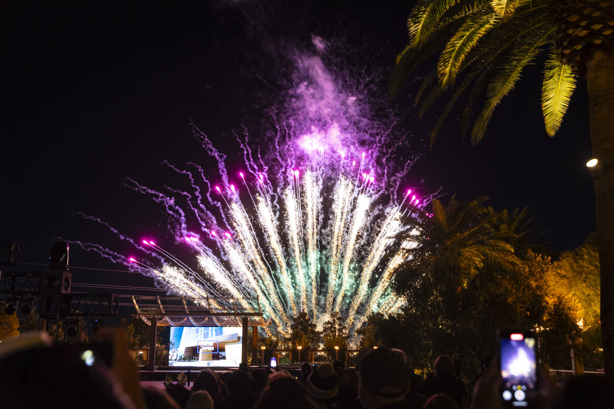 People watch as fireworks go off during the grand opening celebration for the M Resort's n ...