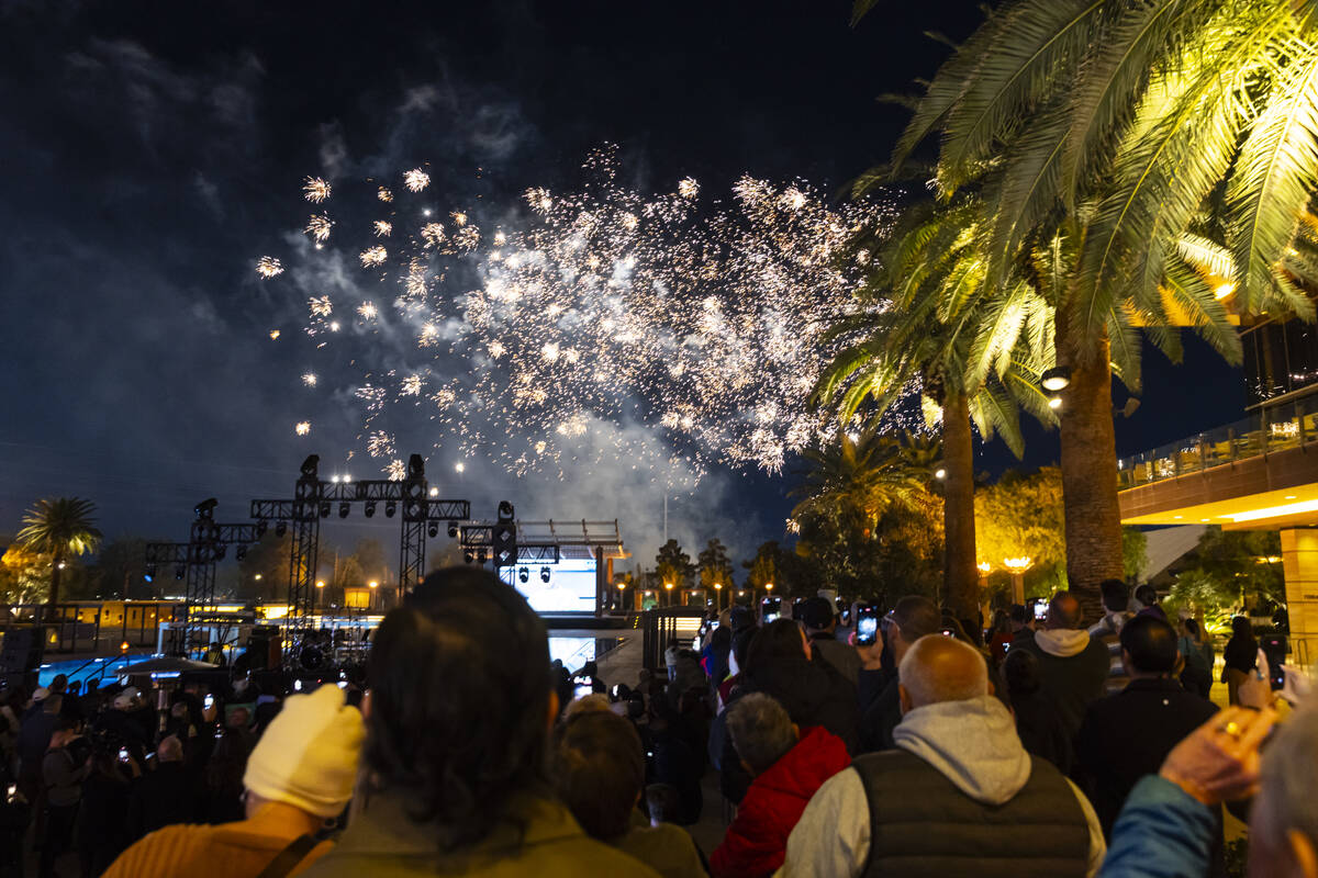 People watch as fireworks go off during the grand opening celebration for the M Resort's n ...