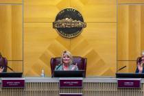 Mayor Michelle Romero, center, Councilwomen Monica Larson, left, and Carrie Cox, right, applaud ...