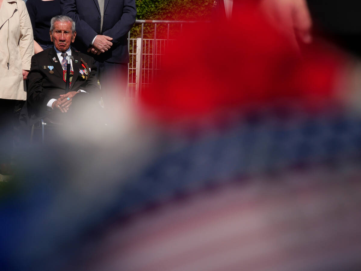 FILE - Charles Shay, a 96-year-old native American from Indian Island, Maine, attends a D-Day c ...