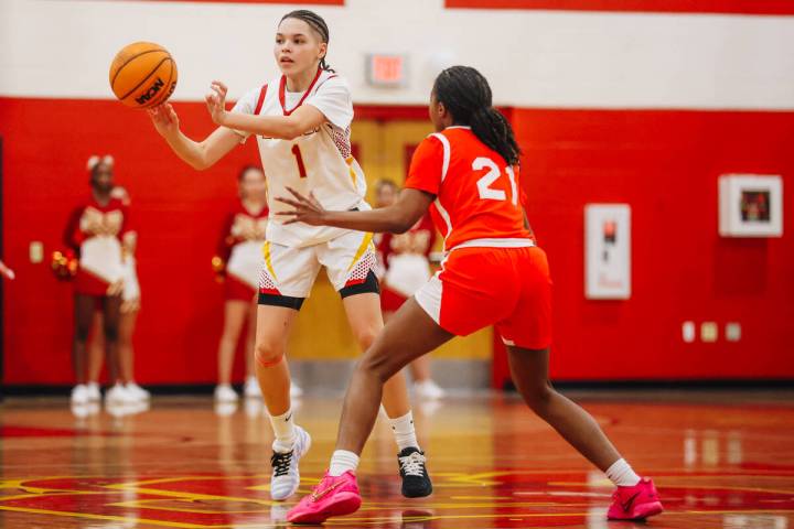 Del Sol guard Ricana Taylor (1) passes the ball during a high school basketball game between De ...