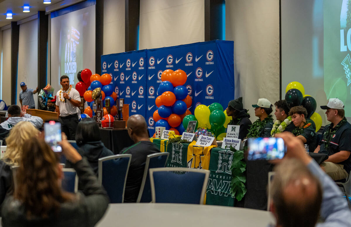 Head football coach Brent Browner speaks about Jett Washington before he signs his offer letter ...
