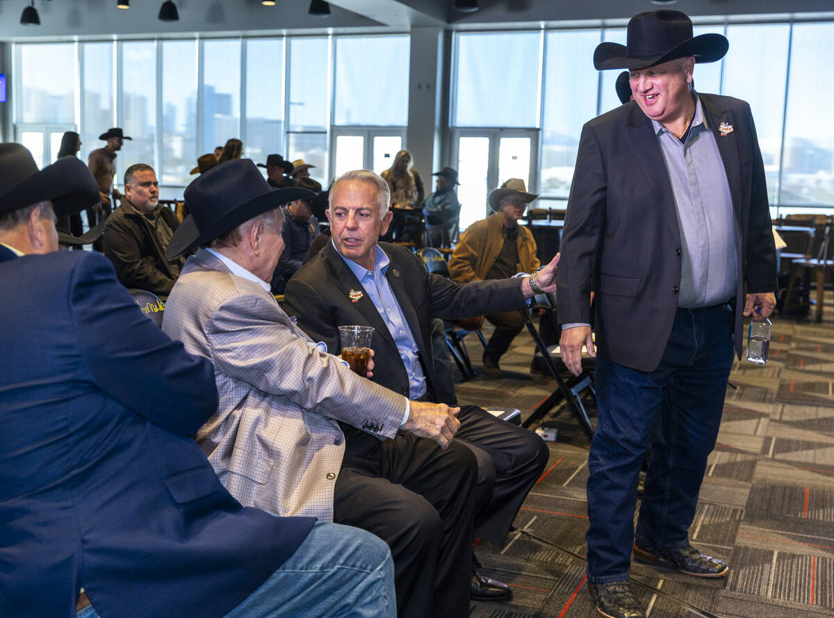 Michael Gaughan chats with Governor Joe Lombardo as Derek Stevens joins the conversation during ...