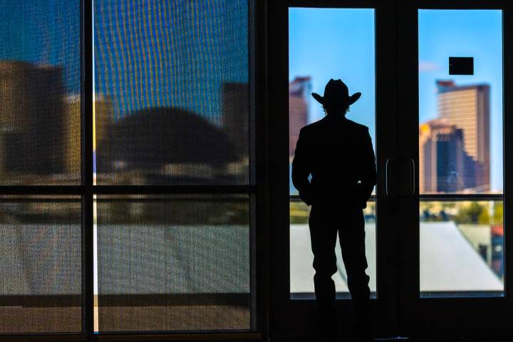 A cowboy checks out the skyline during "2025: 40 Years in Vegas: A Gathering of Champions& ...
