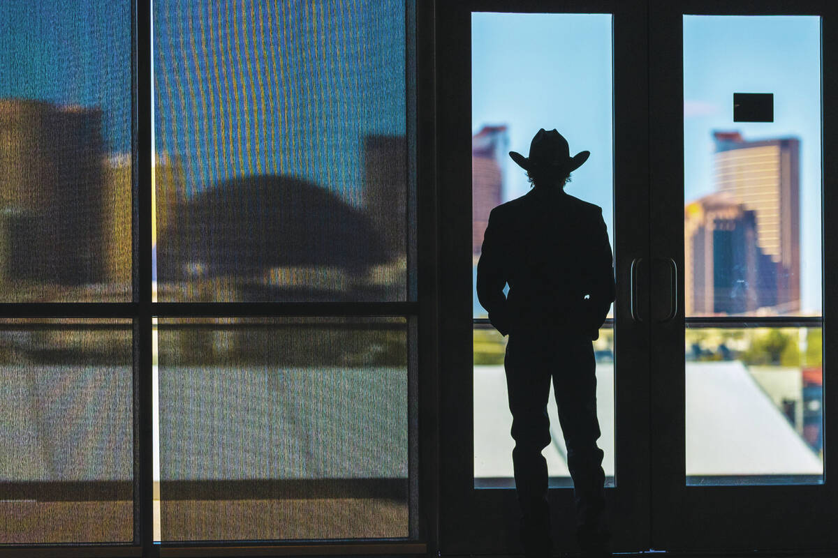 A cowboy checks out the skyline during "2025: 40 Years in Vegas: A Gathering of Champions& ...