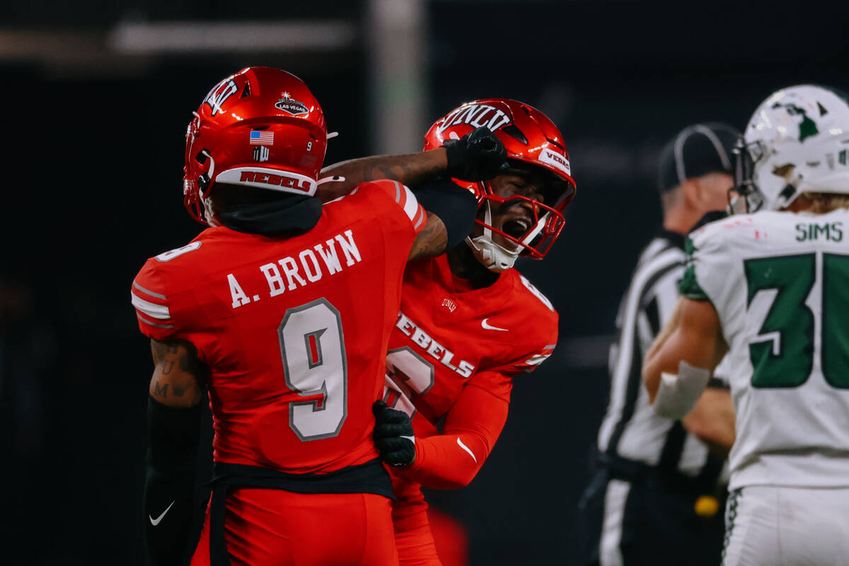 UNLV defensive back Mumu Bin-Wahad (6) and UNLV defensive back Aamaris Brown (9) celebrate a Re ...