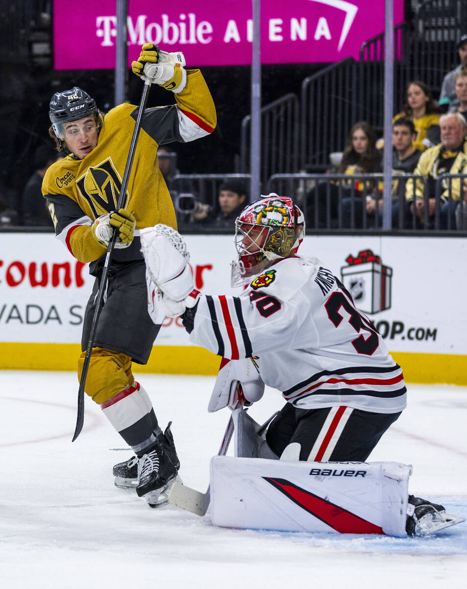 Golden Knights right wing Braeden Bowman (42) attempts to deflect a shot past Chicago Blackhawk ...