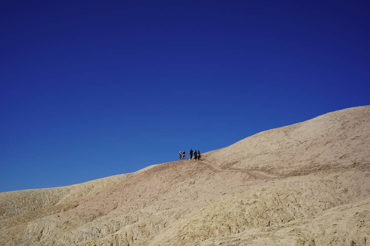 The Death Valley trails beneath Zabriskie Point allow visitors to step into an ancient lakebed ...