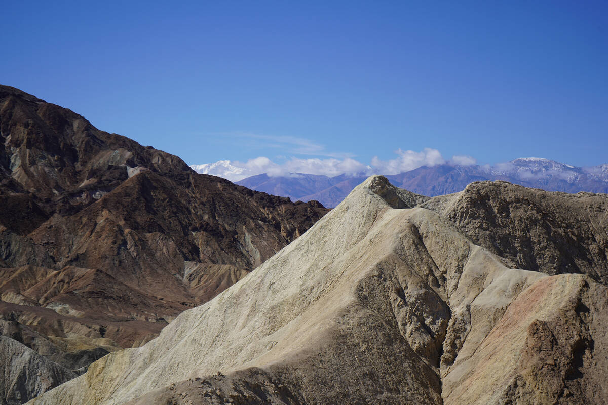 The Death Valley trails beneath Zabriskie Point allow visitors to step into an ancient lakebed ...