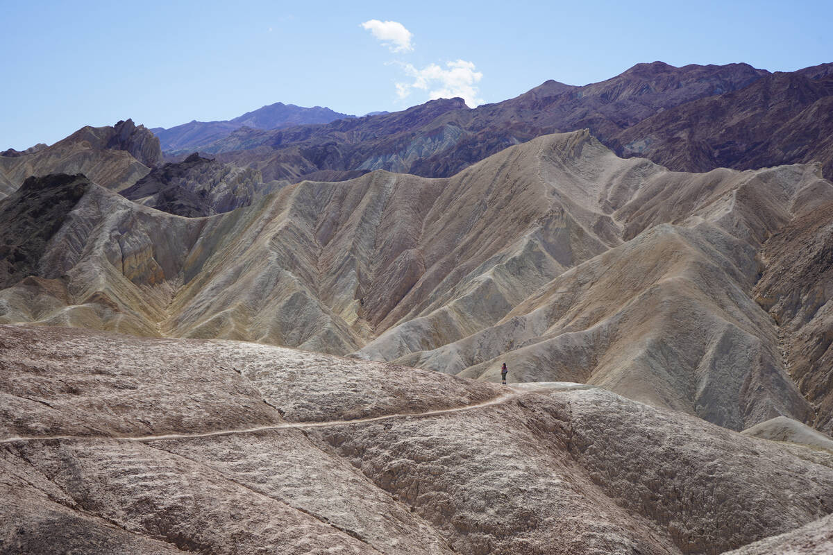 The Death Valley trails beneath Zabriskie Point allow visitors to step into an ancient lakebed ...