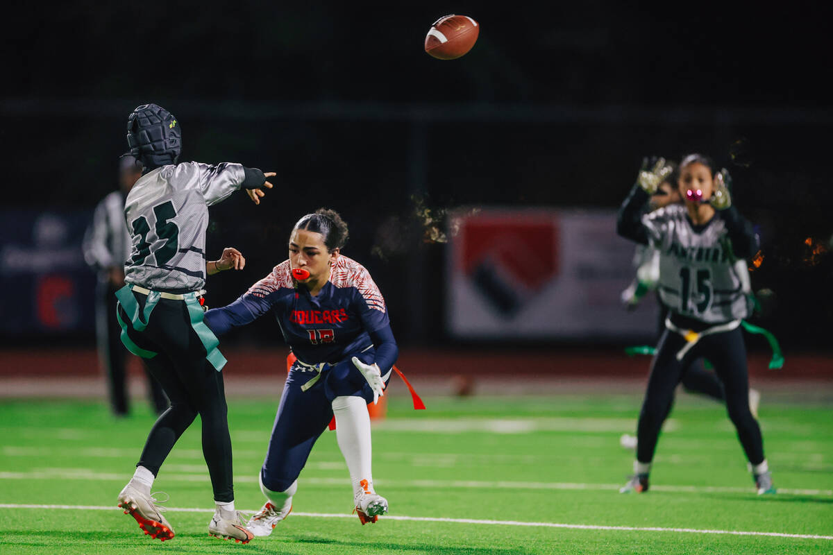 Palo Verde quarterback Yolana Huff throws the ball during a high school flag football game betw ...