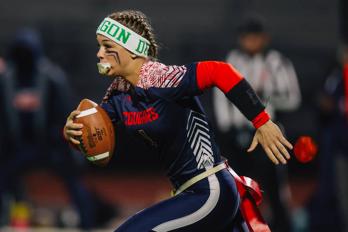 Coronado quarterback Bailey Goldberg runs during a high school flag football game between Coron ...