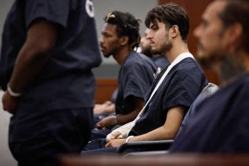 Jose Gutierrez, middle, appears during a hearing to try and overrule his no-bail hold at the Re ...