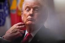 President Donald Trump listens during a Cabinet meeting at the White House, Tuesday, Dec. 2, 20 ...