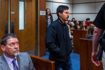 Brandon Dominguez-Chavarria’s stepfather, Valente Ayala, arrives into the courtroom to give t ...