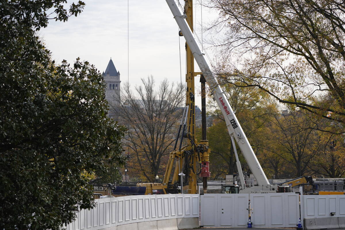 Construction of a new ballroom continues on the East Wing of the White House, Tuesday, Nov. 23, ...