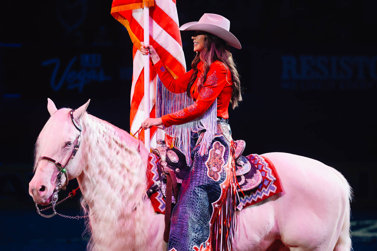 U.S. Secretary of Defense Kristi Noem rides out during the national anthem during day three of ...