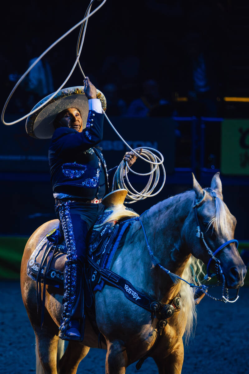 A charro performs during day three of the National Finals Rodeo at the Thomas & Mack Center ...