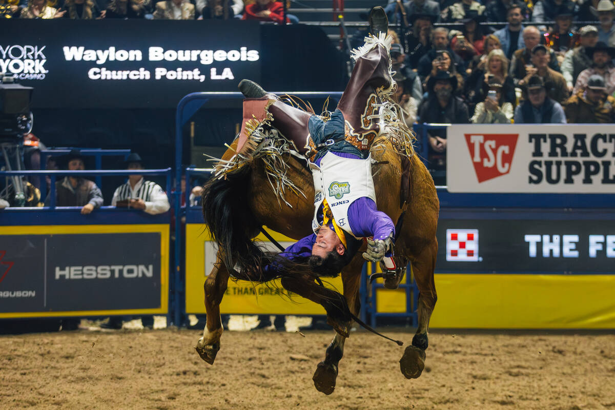 Waylon Bourgeois falls off of Priefert’s Dusty Roads during bareback riding on day three ...