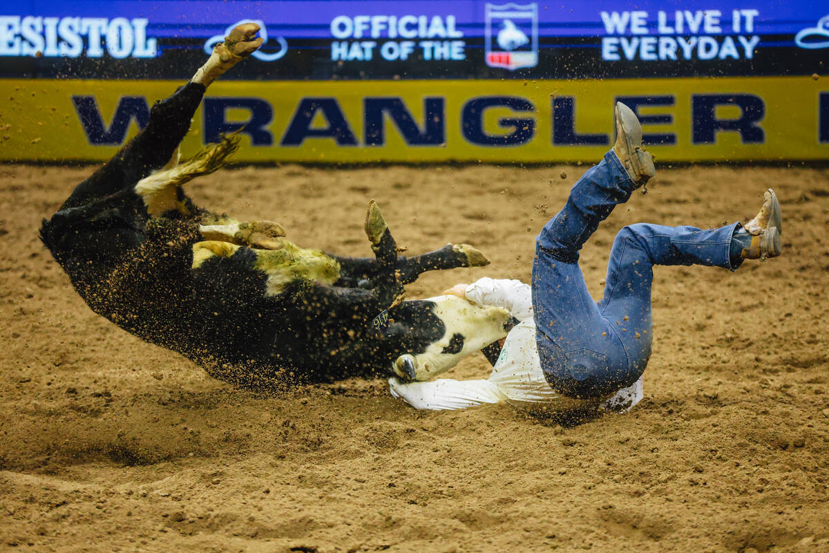 J.D. Struxness falls over while trying to wrestle down a tear on day four of the National Final ...