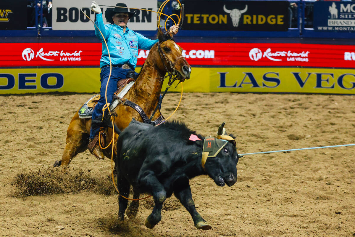 Wesley Thorpe throws out his rope during the steer wrestling portion on day four of the Nationa ...