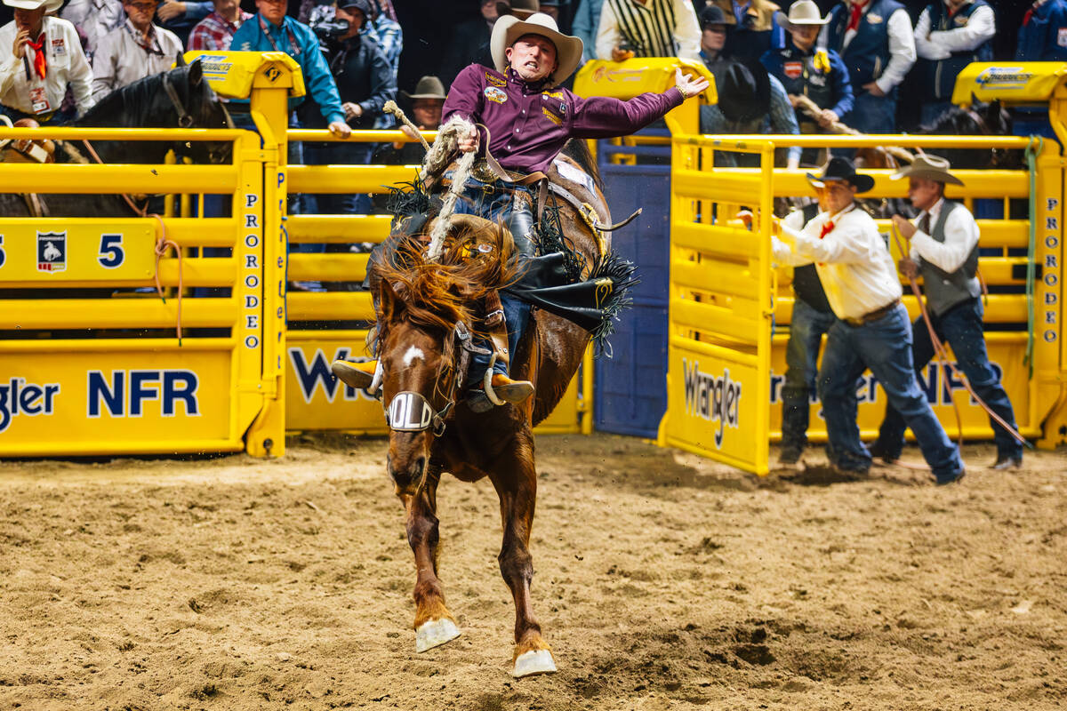 Ben Erickson rides Elvira on day four of the National Finals Rodeo at the Thomas & Mack Cen ...